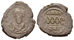 Phocas. AD 602-610. Æ follis (32 mm, 11 g). Constantinople mint, 608-609. dM FOCAS PERP AVG, crowned bust facing, wearing consular robes, holding mapp...