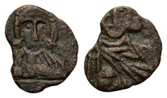 Leo V and Constantine. AD 813-820. Æ 40 Nummi (12 mm, 0,8 g). Syracuse. Crowned bust of Leo facing, wearing loros, holding cross potent. R/ Crowned an...