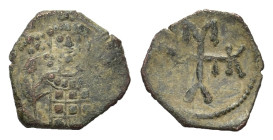 Manuel I Comnenus. 1143-1180 AD. Æ Half Tetarteron (14,0mm, 1,00gr.). Uncertain Greek mint. Crowned bust facing, wearing loros, and holding labarum an...