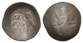 Manuel I Comnenus 1143 – 1180 AD. BI Aspron Trachy. (25mm, 2,50gr.) Christ, wearing tunic and colobium, seated upon throne without back, holding book ...