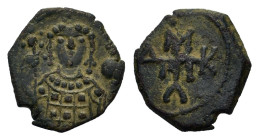 Manuel I Comnenus. 1143-1180 AD. Æ Half Tetarteron (14,5mm, 1,80gr.). Uncertain Greek mint. Crowned bust facing, wearing loros, and holding labarum an...