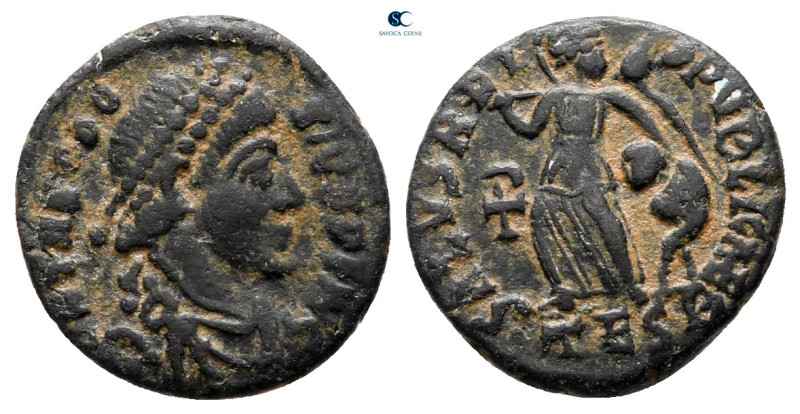 Theodosius I AD 379-395. Thessaloniki
Follis Æ

12 mm, 0,93 g



nearly v...