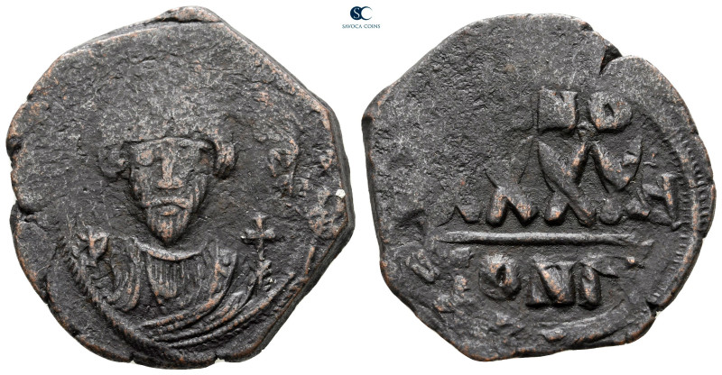 Phocas AD 602-610. Constantinople
Follis or 40 Nummi Æ

30 mm, 10,06 g


...