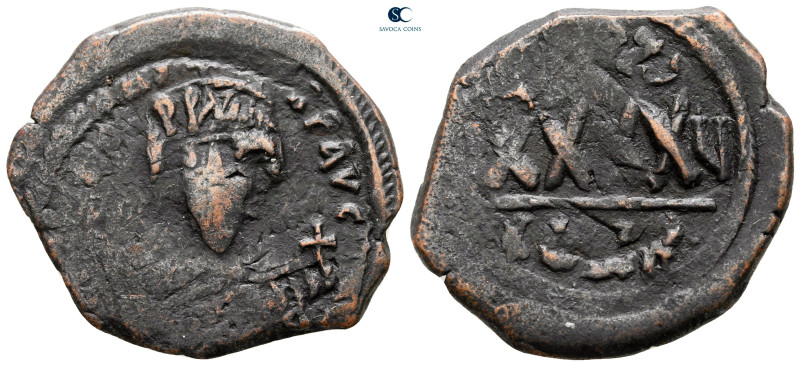 Phocas AD 602-610. Constantinople
Follis or 40 Nummi Æ

31 mm, 9,20 g



...