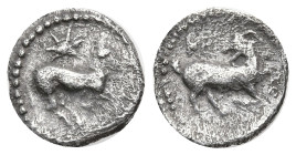Greek
CILICIA. Kelenderis. (425-400 BC).
AR Obol (10.32mm 0.64g)
Obv: Horse prancing right, star above
Rev: KE, kneeling goat right with head reve...