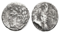 Greek
CILICIA. Uncertain. (Circa 4th century BC)
AR Obol (9.78mm 0.45g)
Obv: Youthful male head left, wearing grain wreath.
Rev: Eagle, with wings...