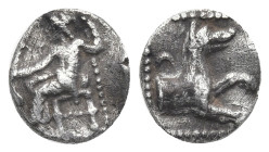 Greek
LYCAONIA. Laranda. (Circa 324/3 BC)
AR Obol (8.41mm 0.49g).
Obv: Baaltars seated left, holding grain ear and grape bunch in his right hand an...