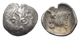 Greek
CARIA. Uncertain mint (Circa 450-400 BC).
AR Tetartemorion (7.84mm 0.14g)
Obv: Foreparts of two confronted bulls, with horns intertwined
Rev...