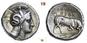 LUCANIA Thurium (IV Sec. a.C.) Dinomos o Distatere. D/ Testa elmata di Athena R/ Toro cozzante; all'esergo due pesci HN Italy 1823 SNG Cop. 1430 Ag g ...
