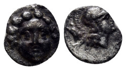 Pisidia. Selge circa 350-300 BC. Obol AR (10mm, 0.9 g) Gorgoneion / Head of Athena to right, wearing crested Attic helmet; behind, astragalos.