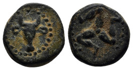 PISIDIA, Adada. 1st century BC. Æ (13mm, 3.7 g). Facing bucranium, garlanded / Triskeles.