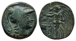 PAMPHYLIA, Side. Circa 1st Century BC. Æ (16mm, 3.4 g). Head of Athena right, wearing Corinthian helmet / Nike advancing left, holding wreath; pomegra...