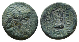 Seleukid Kingdom. Antiochos II Theos. 261-246 B.C. Æ (16mm, 4.3 g). Sardes mint. Laureate head of Apollo right / BAΣIΛEΩΣ ANTIOXOY, tripod, anchor bel...