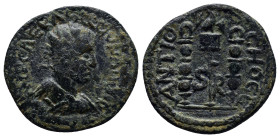 Pisidia, Antiochia. Valerian I. A.D. 253-260. Æ (21mm, 5.9 g). Radiate, draped and cuirassed bust of Valerian I right / Legionary eagle between two st...