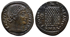 Constantine I. AD 307/310-337. Æ Follis (18mm, 3.6 g). Alexandria mint. Struck AD 329-330. Laureate head right / Camp gate; star above; wreath-I//SMAL...