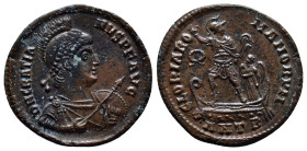 Gratian AD 375-383. Antioch Follis Æ (23mm, 4.5 g). D N GRATIANVS P F AVG, helmeted, pearl-diademed, draped and cuirassed bust right holding spear and...