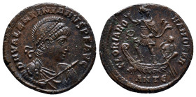 VALENTINIAN II (375-392). Ae. (22mm, 5.1 g) Antioch. Obv: D N VALENTINIANVS P F AVG. Helmeted, diademed, draped and cuirassed bust right, holding shie...