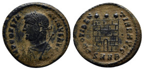 CONSTANTINE I. 307-337 AD. Æ Follis (19mm, 3.3 g). Heraclea mint. Struck 318-20 AD. IMP CONSTA-NTINVS AVG, laureate and mantled bust left, holding map...