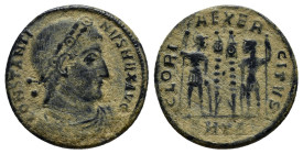 Constantine I Æ Nummus. (18mm, 2.5 g), AD 330-335. CONSTANTINVS MAX AVG, diademed, draped and cuirassed bust right / GLORIA EXERCITVS, two soldiers he...