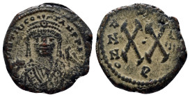 Tiberius II Constantine, 578-582 AD. Æ Half Follis (21mm, 6.7 g) of Antioch Bust facing, wearing crown with trefoil ornament and consular robes, holdi...