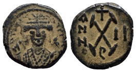 Maurice Tiberius Æ 10 Nummi. (16mm, 2.6 g) Theoupolis (Antioch) mint, dated RY 2 = AD 583/4. M TIOI NIATIPP, crowned facing bust, with trefoil ornamen...