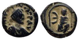 Justin I, 518-527 AD. Æ Pentanummium (13mm, 2.4 g) of Antioch. Laureate draped bust / Tyche seated, E, all within shrine.