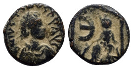 Justin I, 518-527 AD. Æ Pentanummium (13mm, 2.0 g) of Antioch. Laureate draped bust / Tyche seated, E, all within shrine.