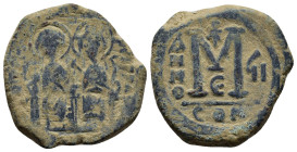 Justin II, with Sophia. 565-578. Æ Follis (30mm, 16.5 g). Constantinople mint, 5th officina. Dated RY 7 (571/2). Nimbate figures of Justin and Sophia ...