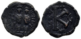 Justin II and Sophia (565-578). Æ 20 Nummi (22mm, 7.3 g). Nicomedia, year 7 (571/72). Justin and Sophia seated facing on double throne, holding globus...