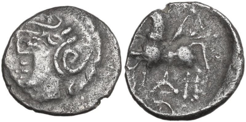 Celtic World. Central Gaul, Lingones. AR Quinar, 120-50 BC. Obv. Helmeted head o...