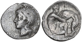 Greek Italy. Southern Apulia, Tarentum. AR Diobol, c. 380-325 BC. Obv. Head of Athena left, wearing plain helmet. Rev. Herakles kneeling right, strang...