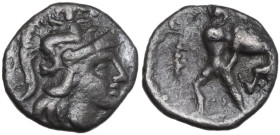 Greek Italy. Southern Apulia, Tarentum. AR Diobol, 325-280 BC. Obv. Head of Athena right, wearing helmet decorated with Scylla hurling rock. Rev. Hera...