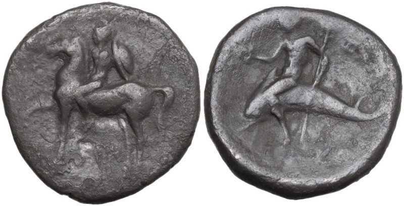 Greek Italy. Southern Apulia, Tarentum. AR Nomos, circa 272-240 BC. Obv. Helmete...