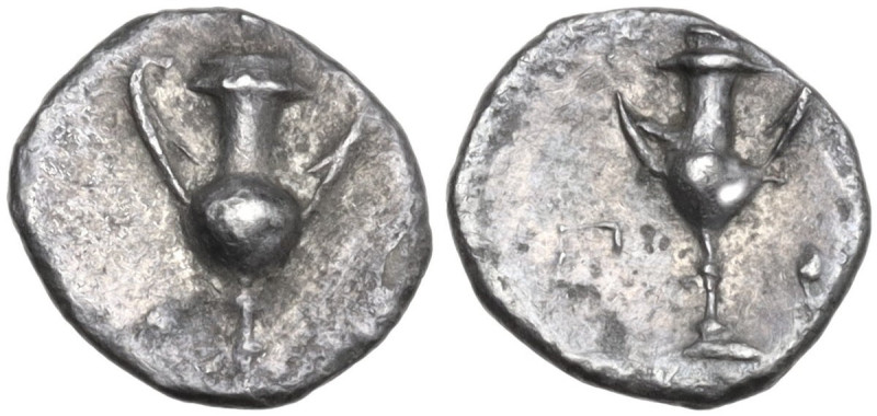 Greek Italy. Southern Apulia, Tarentum. AR Obol, c. 280-228 BC. Obv. Kantharos. ...