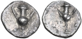 Greek Italy. Southern Apulia, Tarentum. AR Obol, c. 280-228 BC. Obv. Kantharos. Rev. Kantharos. HN Italy 1076; HGC 1 927. AR. 0.40 g. 8.00 mm. Light i...
