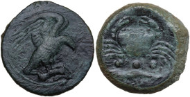 Sicily. Akragas. AE Tetras or Trionkion, c. 425-410 BC. Obv. Eagle standing right on hare, head lowered, wings spread. Rev. Crab; above, mussel shell;...