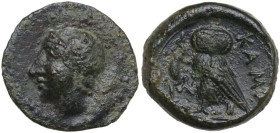Sicily. Kamarina. AE Tetras, c. 425-405 BC. Obv. Head of Athena left, wearing helmet decorated with wing. Rev. Owl standing left, head facing, wings c...
