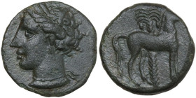 Punic Sardinia. AE 16 mm, late 4th-early 3rd century BC. Obv. Head of Tanit left, wearing wreath of grain. Rev. Horse standing right in front of palm ...