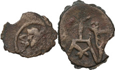 Greek Asia. Chach, Chach. AE Drachm, 7th-8th cent. AD. Obv. Portrait of ruler 3/4 right, wearing man-faced head dress; to right, cross. Rev. Tamgha; a...