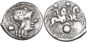 T. Quinctius Flamininus. Denarius, 126 BC. Obv. Helmeted head of Roma right; behind, apex; below chin, barred X. Rev. The Dioscuri galloping right; be...