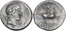 Pub. Crepusius. Denarius, 82 BC. Obv. Laureate head of Apollo right; behind, sceptre; before, control-symbol; behind, control-letter. Rev. Horseman ga...
