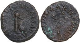 Nero (54-68). AE Quadrans, Rome mint. Obv. NERO CLAVD CAESAR AVG. Column, upon which rests a crested helmet, spear behind, round shield leaning agains...