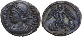 Constantine I (307-337). Commemorative series. AE Follis, Treveri mint. Obv. CONSTAN-TINOPOLIS. Helmeted and laureate bust of Constantinopolis, wearin...