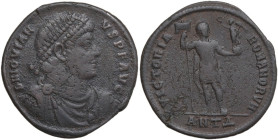 Jovian (363-364). AE Double Maiorina, Antioch mint. Obv. Pearl-diademed, draped and cuirassed bust right. Rev. Jovian standing facing; holding standar...