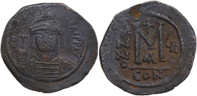 Maurice Tiberius (582-602). AE Follis. Constantinople mint. Obv. Blundered legend. Crowned bust facing, wearing consular robes and holding mappa and e...