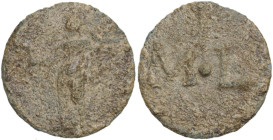 PB Tessera, 1st century BC-1st century AD. D/ Standing figure left, holding small statue in right hand. R/ M•L. PB. 2.56 g. 17.50 mm. Good F/About VF....