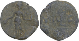 PB Tessera, 1st century BC-1st century AD. D/ Female figure standing left, holding grain-ears or flowers downwards and small statue (palladium?). R/ I...