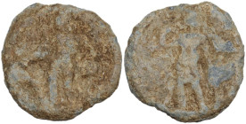 PB Tessera, 1st century BC-1st century AD. D/ Standing figure left, holding uncertain object and resting left elbow on uncertain structure. R/ Male fi...