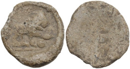 PB Tessera, 1st century BC-1st century AD. D/ Lion standing right, one forepaw resting on globe set on ground. R/ Blank. PB. 2.73 g. 14.00 mm. Good F.