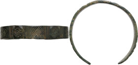 Bronze Age, Balkan. Bronze bracelet. Carved and punched geometric patterns. Diameter: 55 mm. Width: 10 mm.